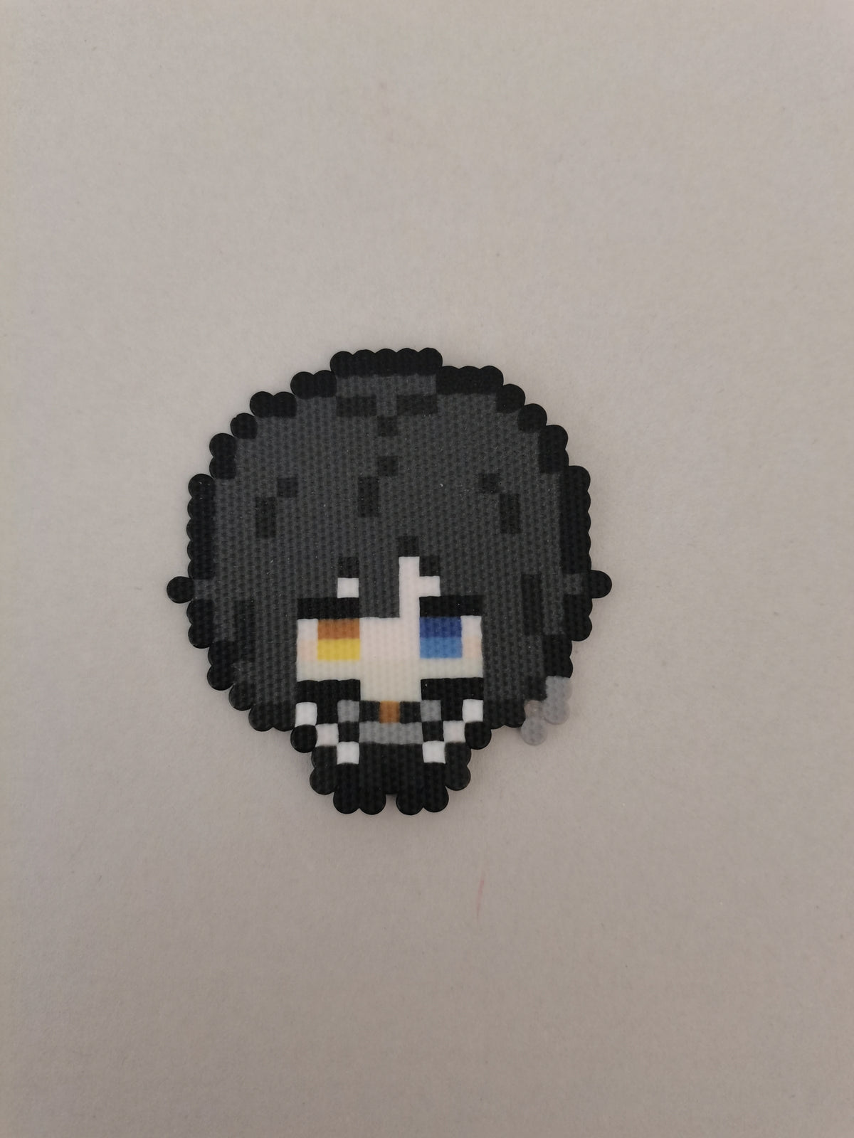 Obanai Iguro (Serpent) — actual handmade pixel bead character photograph.