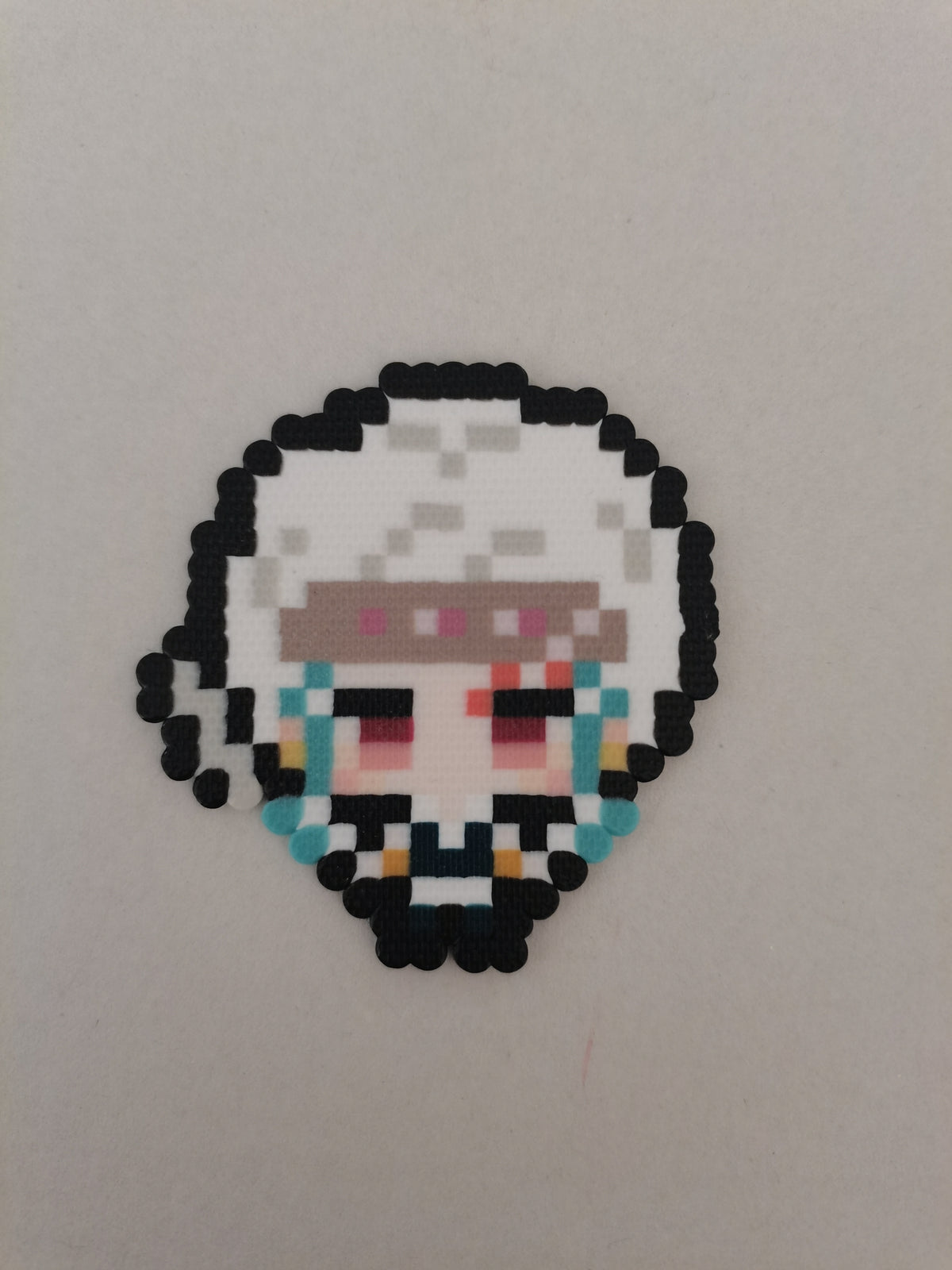 Tengen Uzui (Sound) — actual handmade pixel bead character photograph.
