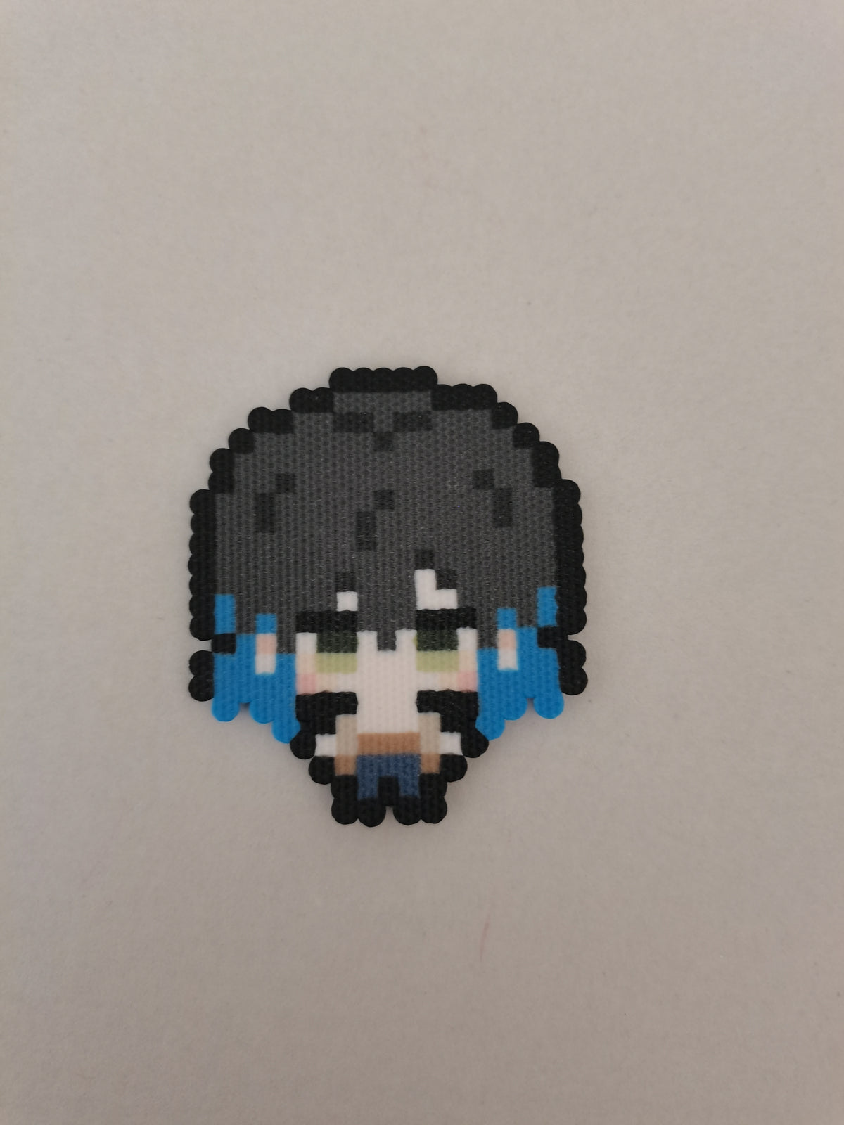 Inosuke Hashibira — actual handmade pixel bead character photograph.